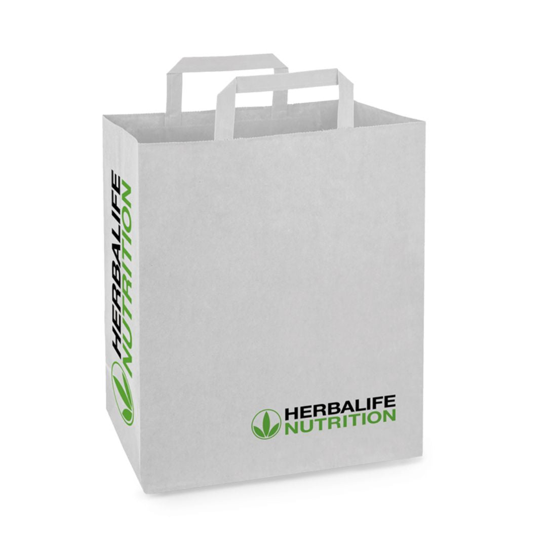 En papirpose med Herbalife Nutrition-logo foran og på siden.