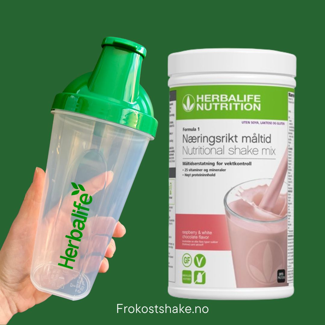 Bringebær og hvit sjokolade soyafri Herbalife shake-boks og shakerflaske i hånden på grønn bakgrunn, Frokostshake.no.