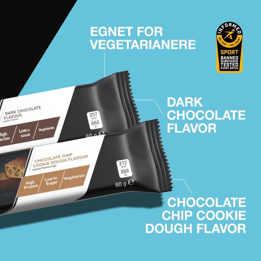 To Herbalife H24 Achieve proteinbarer mørk sjokolade og chocolate chip cookie dough og teksten “Egnet for vegetarianere” samt logoen for Informed Sport. 