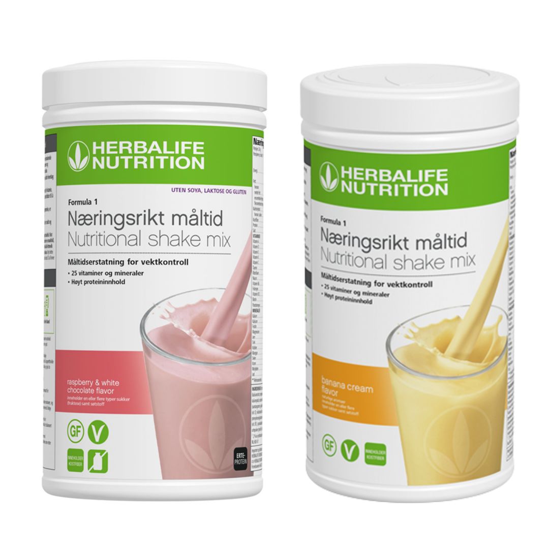 En boks Herbalife Formula 1 shakemix med bringebær og hvit sjokoladesmak og en med banansmak.