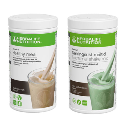 En boks Herbalife Formula 1 shakemix med cookie crunch-smak og en med mintsjokolade-smak