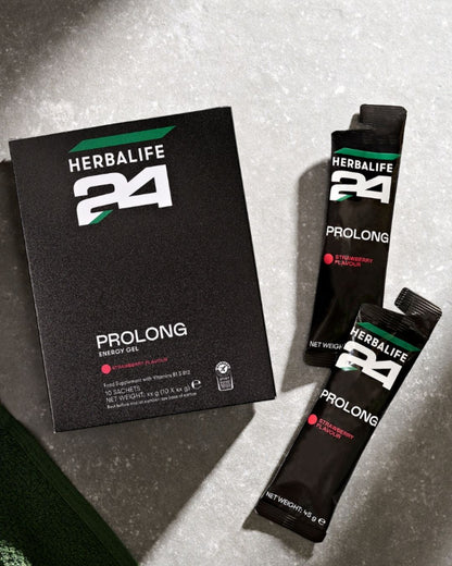 En pakke Herbalife H24 Prolong Energy Gel og 2 gelposer på et bord.