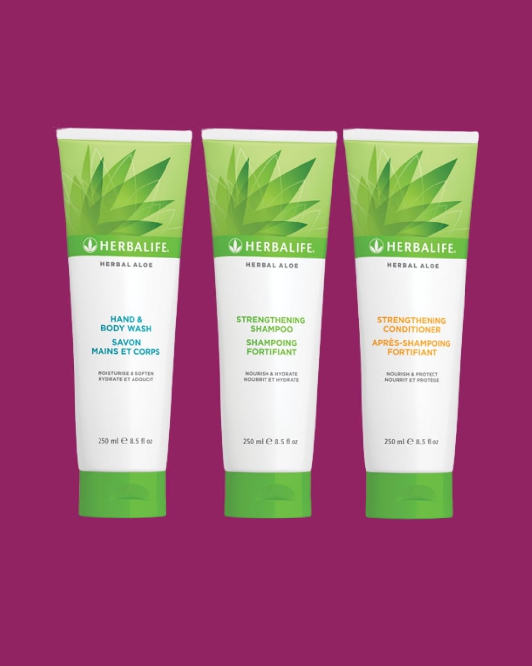 En tube Herbalife Herbal Aloe Strengthening Shampoo, Strengthening Conditioner og Hand & Body Wash på lilla bakgrunn.