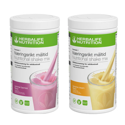 En boks Herbalife Formula 1 shakemix med summer berries-smak og en med banansmak.