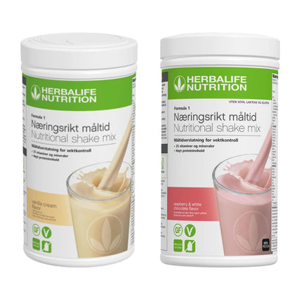 En boks Herbalife Formula 1 shakemix med vaniljesmak og en med bringebær og hvit sjokolade-smak.