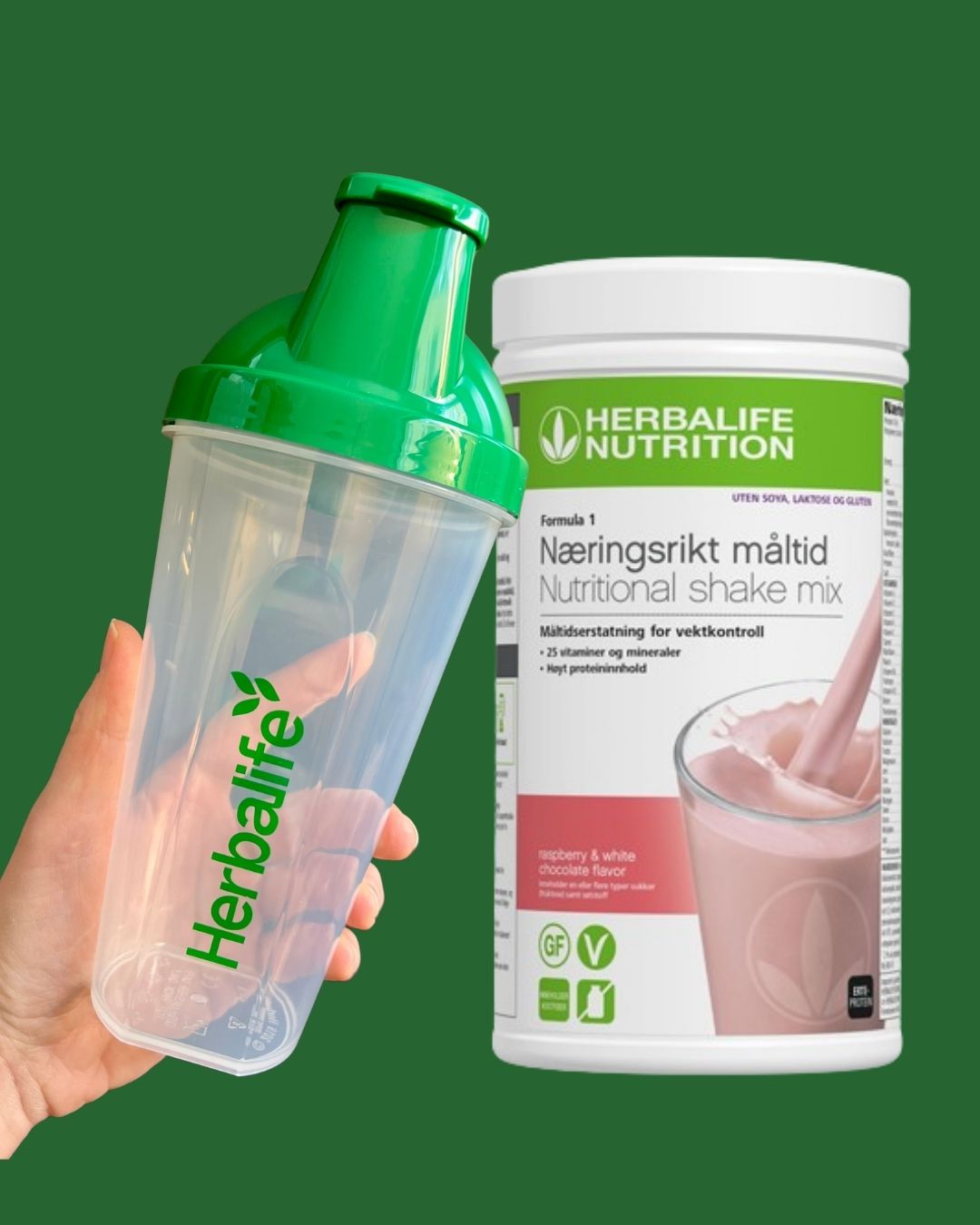 Bringebær og hvit sjokolade soyafri Herbalife shake-boks og shakerflaske i hånden på grønn bakgrunn, Frokostshake.no. 