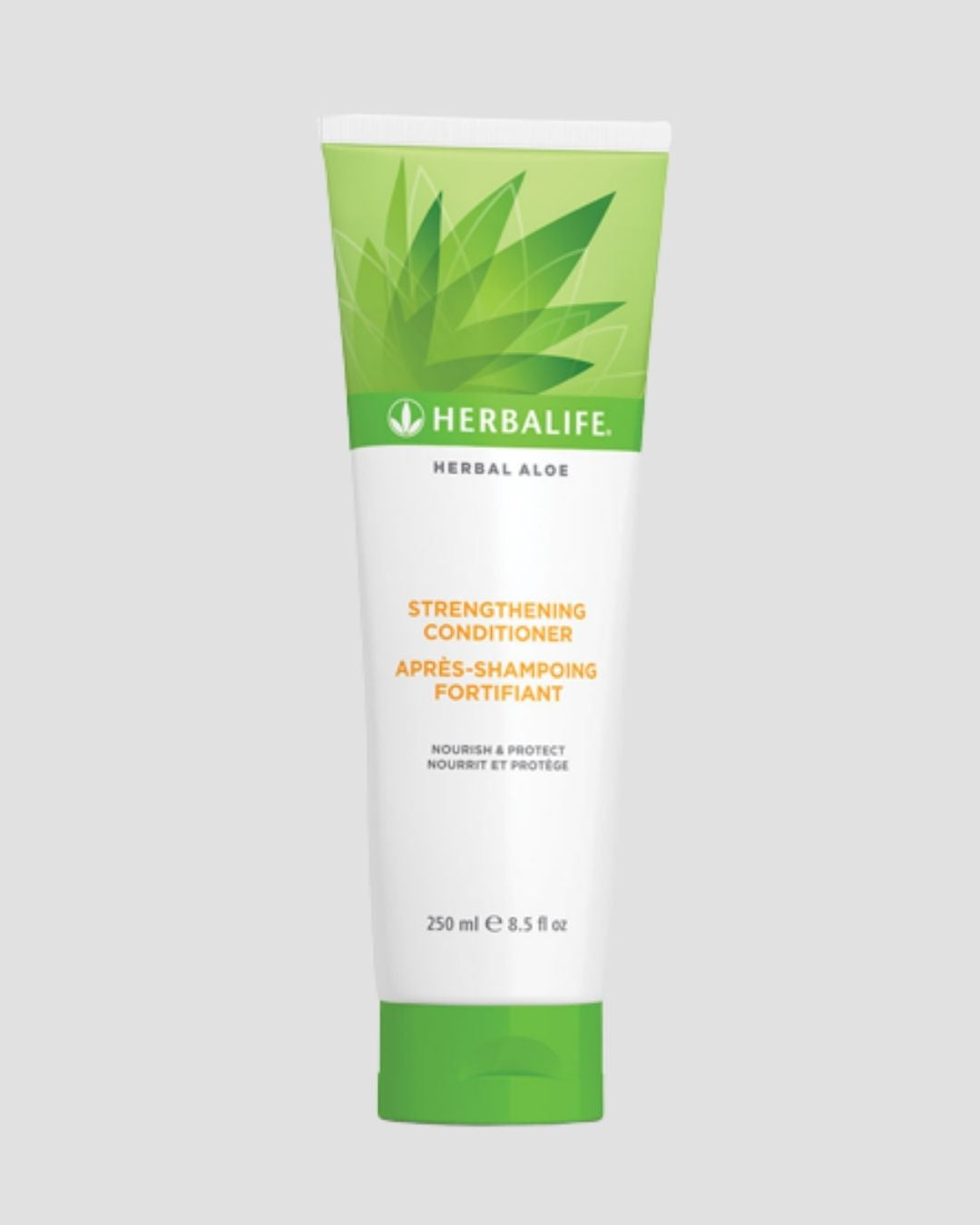 Herbalife Herbal Aloe Strengthening Conditioner balsam på grå bakgrunn