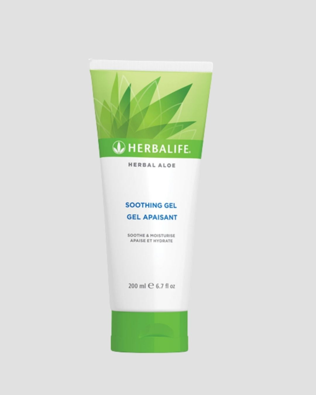 En tube Herbalife aloe vera gel på grå bakgrunn.