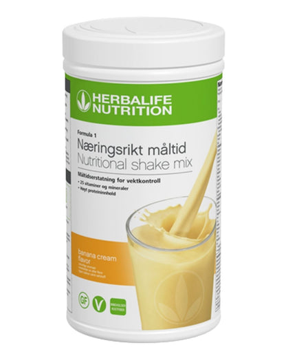 En boks Herbalife Formula 1 shakemix med banana cream-smak på hvit bakgrunn.