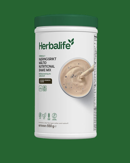 Herbalife F1 shake med Cookie Crunch smak på grønn bakgrunn.  Næringsriktig måltid og måltidserstatter.