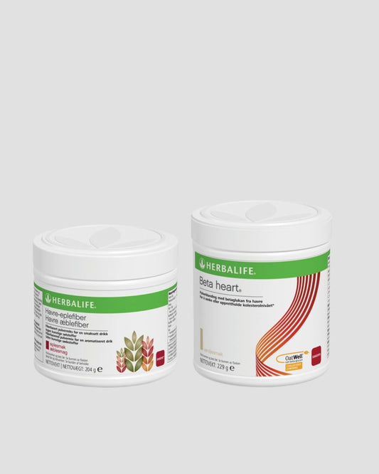 En boks Herbalife Nutrition Havre-eplefiberdrikk kosttilskudd med fiber og eplesmak og en boks Herbalife Beta heart kosttilskudd fra havre. 
