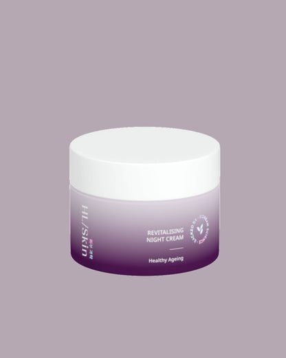 En krukke Herbalife HL/Skin Revitalising Night Cream på lyslilla bakgrunn.