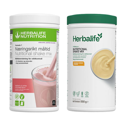 En boks Herbalife Formula 1 shakemix med bringebær og hvit sjokoladesmak og en med banansmak.