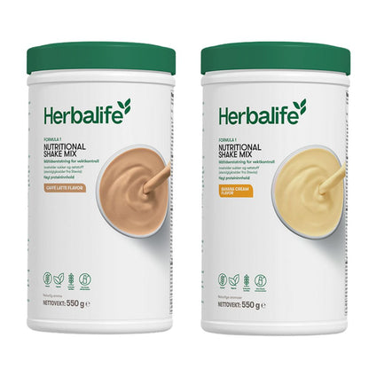 En boks Herbalife Formula 1 shakemix med caffe latte-smak og en med banansmak.