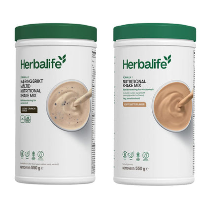 En boks Herbalife Formula 1 shakemix med cookie crunch-smak og en med caffe latte-smak.