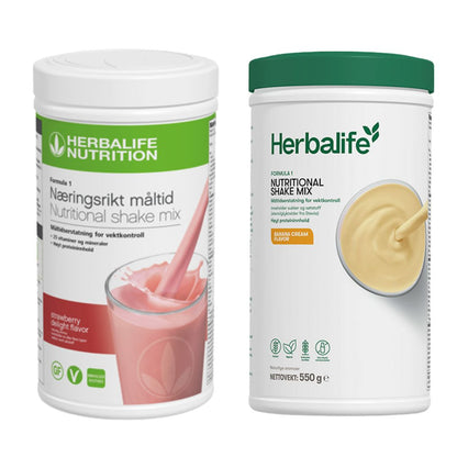 En boks Herbalife Formula 1 shakemix med jordbærsmak og en med banansmak.