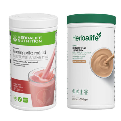 En boks Herbalife Formula 1 shakemix med jordbærsmak og en med caffe latte-smak.