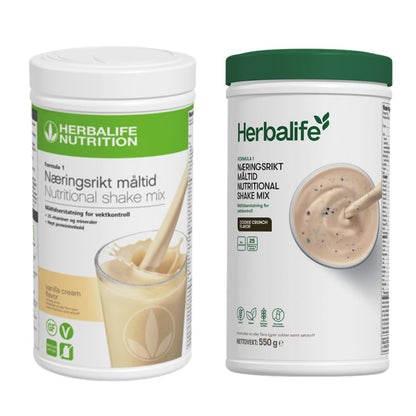 En boks Herbalife Formula 1 shakemix med vaniljesmak og en med cookie crunch-smak.