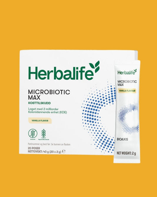 En pakke Herbalife Microbiotic Max kosttilskudd med probiotika og prebiotisk fiber på gul bakgrunn.