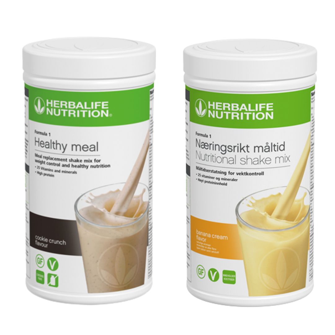 En boks Herbalife Formula 1 shakemix med cookie crunch-smak og en med banansmak.