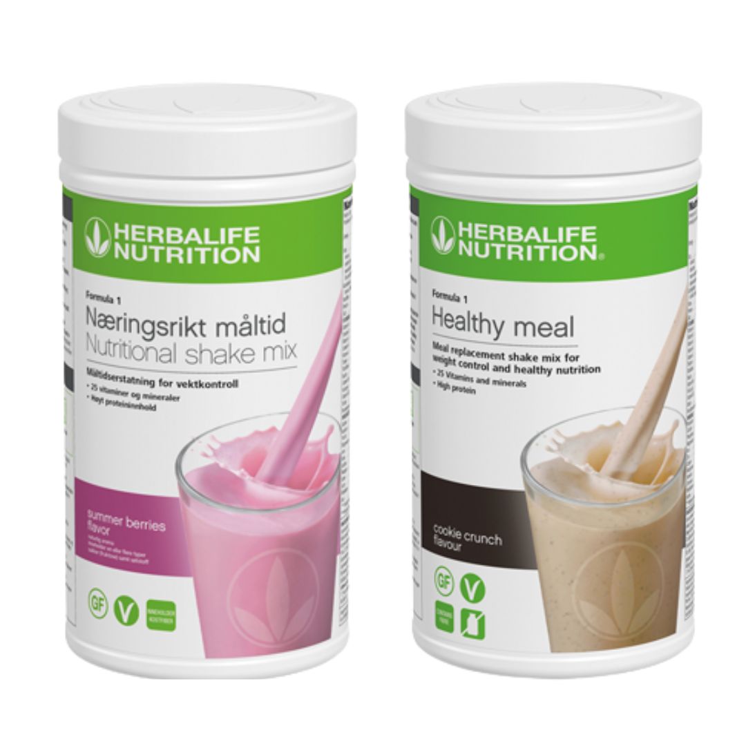 En boks Herbalife Formula 1 shakemix med summer berries-smak og en med cookie crunch-smak.